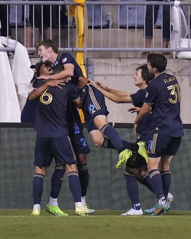 Aug 31, 2022; Chester, Pennsylvania, USA; Philadelphia Union defender Nathan Harriel (26) celebrates with midfielder Daniel Gazdag (6), midfielder Jack McGlynn (16), midfielder Paxten Aaronson (30), and midfielder Leon Flach (31) after scoring a goal against the Atlanta United in the second half at Subaru Park. Mandatory Credit: Mitchell Leff-USA TODAY Sports
